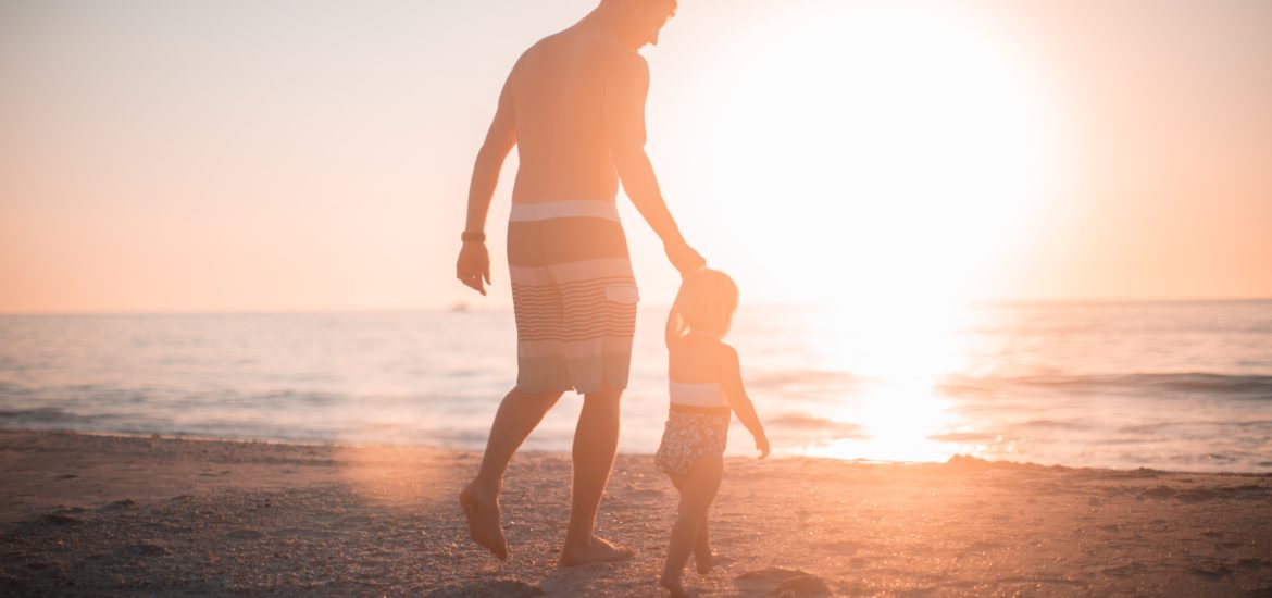 Father leading child