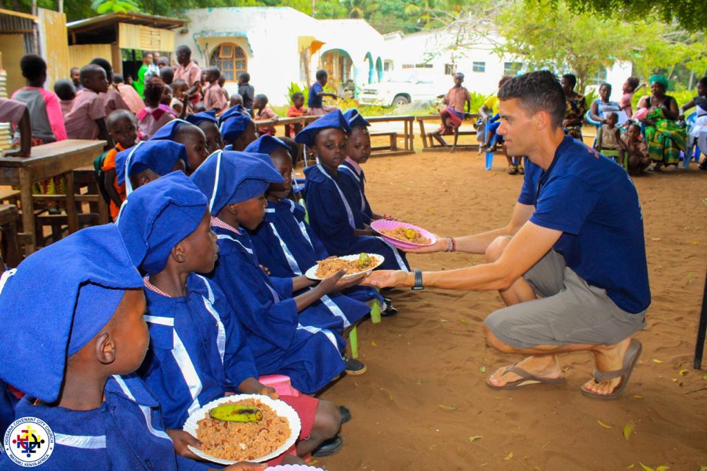 Justin serving Agape kids in Kenya